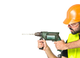 workman with drill over white background