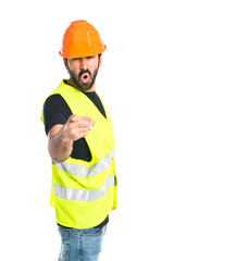 Workman shouting over isolated white background