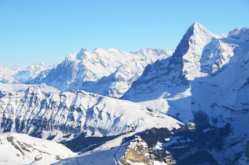 Fototapeta na wymiar Eiger, Moench and Jungfrau, famous Swiss mountain peaks