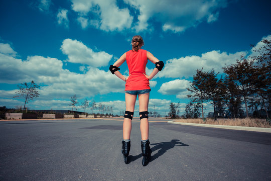 Young woman rollerblading