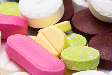 Colorful tablets with capsules