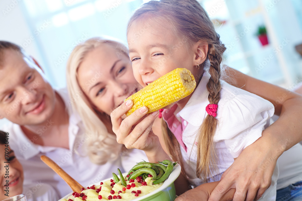 Poster eating corn