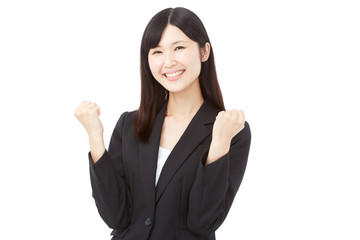 ガッツポーズするビジネスウーマン