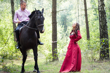 Fototapeta premium man on horse and girl