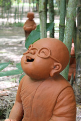Fototapeta na wymiar Doll clay monk.