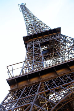 the Eiffel Tower is photographed from the lower point of filming