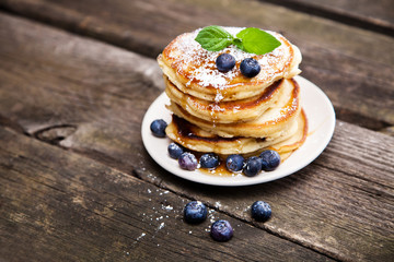 Delicious pancakes with blueberry and mint