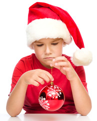 Young unhappy girl in christmas cloth