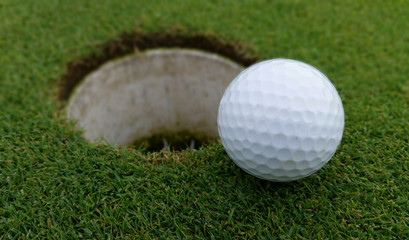 Golf Ball And Hole in a macro view