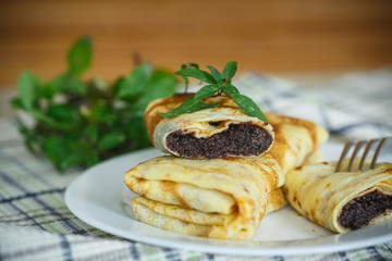 thin sweet pancakes with jam