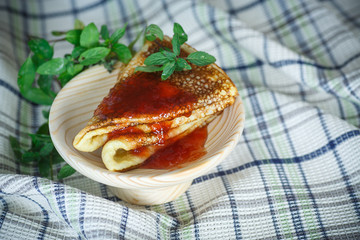 thin sweet pancakes with jam