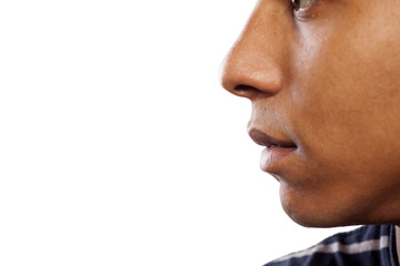 close up shot of the nose and mouth of a dark-skinned young man - obrazy, fototapety, plakaty