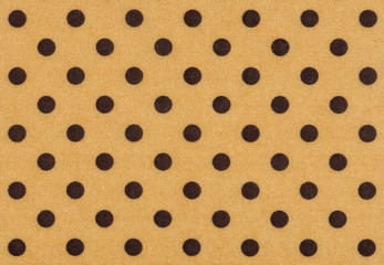 Beiger Stoff mit dunklen Punkten