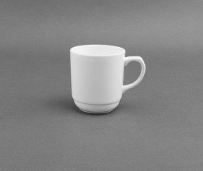 White cup on gray background.