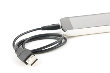 micro usb cable connected to smart phone
