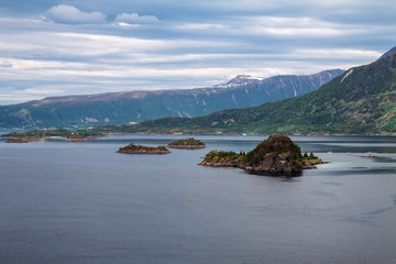 Fototapeta na wymiar scenic view of fjord and snow mountains, Norway, Lofoten