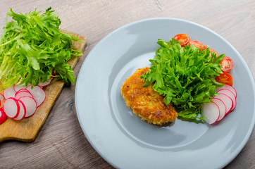 Breaded pork chops in Parmesan cheese