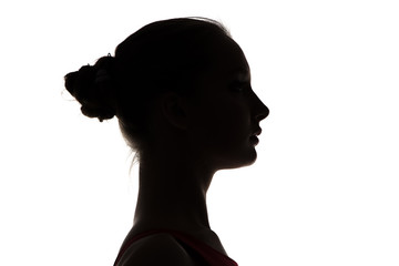 Silhouette of teenage girl's head