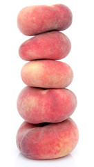 Stacked peach fruits