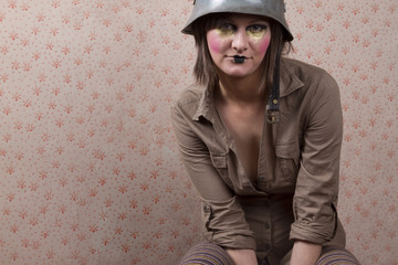woman in army hat and a  creative makeup