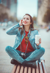 Hipster girl drinking coffee