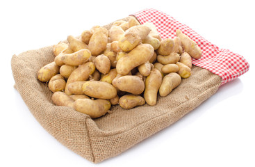New rattes potatoes on burlap