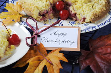 Happy Thanksgiving table setting with cherry apple crumble pie 