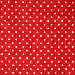 Polka dot on red canvas cotton texture, fabric background