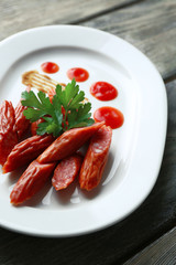 Smoked thin sausages and vegetables