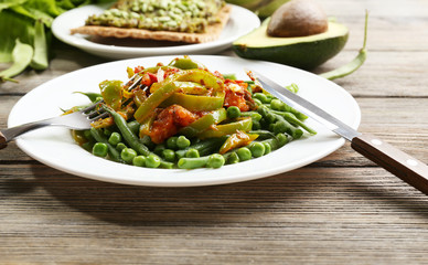 Healthy salad with peas and asparagus served