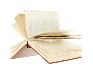 Opened book isolated on white