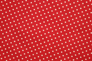 Polka dot on red canvas cotton texture, fabric background