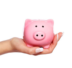 Piggy Bank in Female Hand isolated