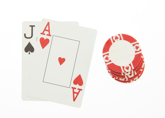 Blackjack hand with casino chip