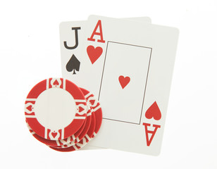 Blackjack hand with casino chip