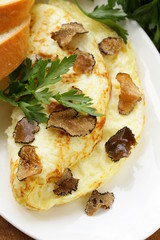 gourmet omelette with black truffle and herbs