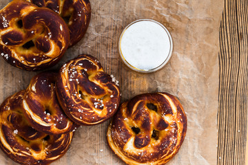 Refreshing beer ready to drink and fresh bavarian pretzels