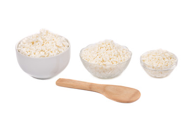 Cottage cheese in various bowls.