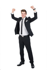 Portrait Of Successful Businessman With Arms Raised