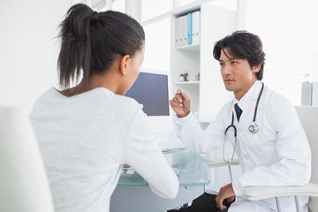 Doctor talking with his patient