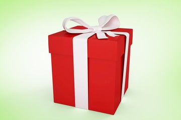 Composite image of red gift with white bow