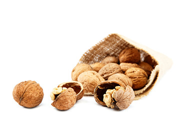 Walnut in a bag on a white background.