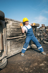 Worker in a junkyard