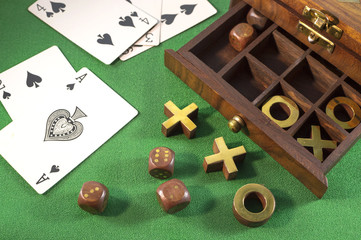 Cards with tic-tac-toe in wooden box