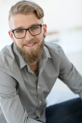 Portrait of stylish young man with beard