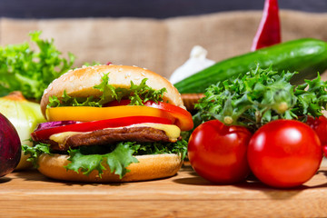 homemade hamburger with fresh vegetables, close up