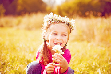 little girl on the meadow