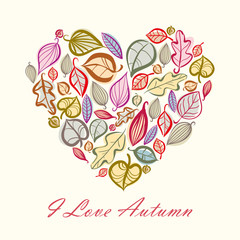 Autumn card design with heart made of leaves.
