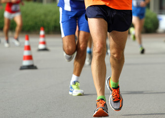 athletes ' legs with sneakers run fast
