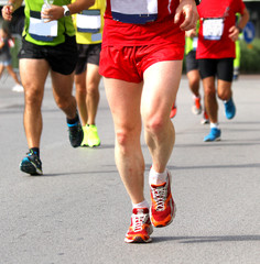 athletes of various nationalities run fast Marathon in the stree